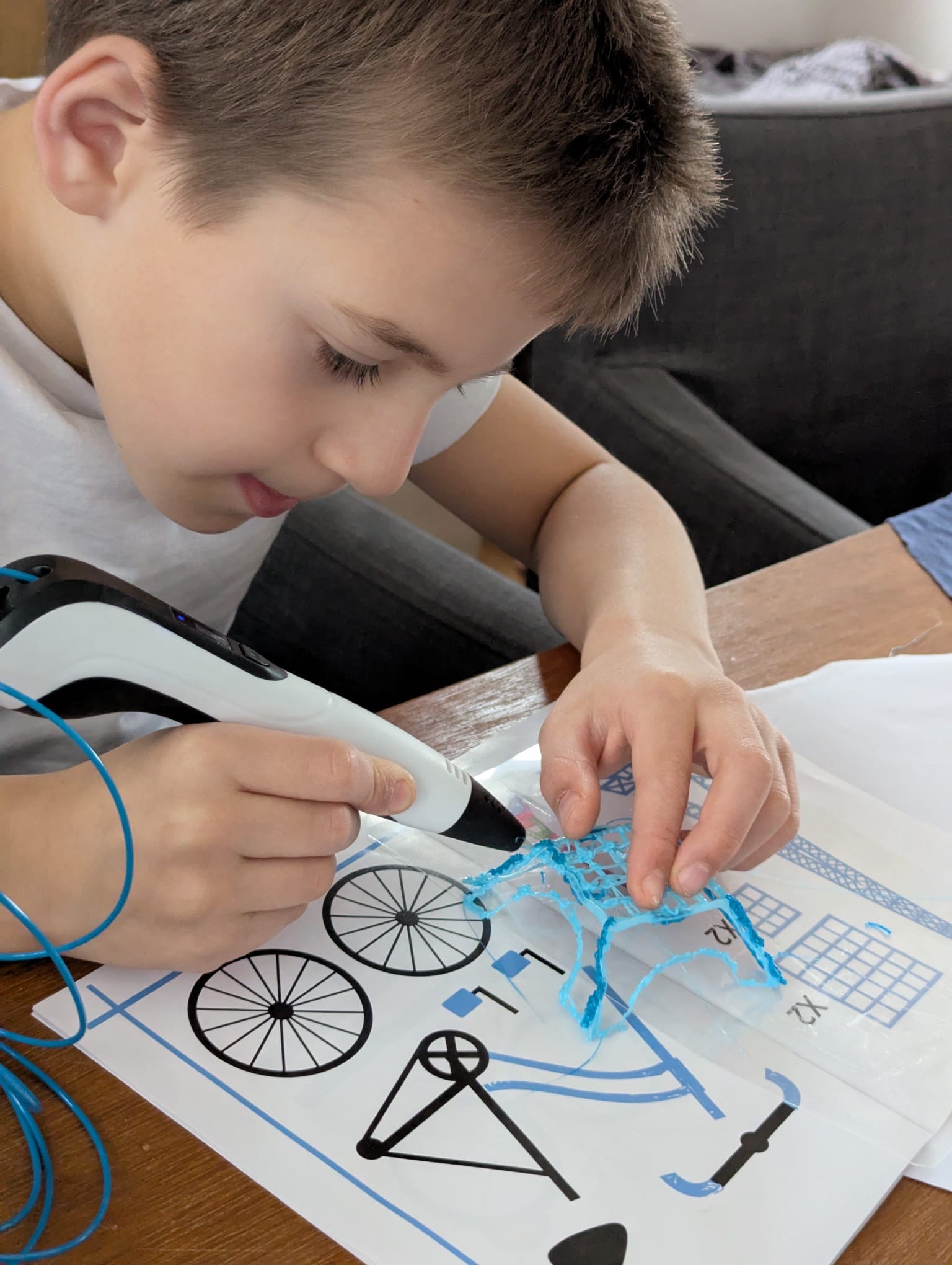 Creative problem solving using a 3D pen during a tutoring session.